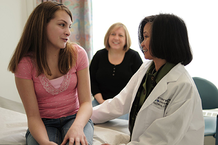 doctor talking to patient