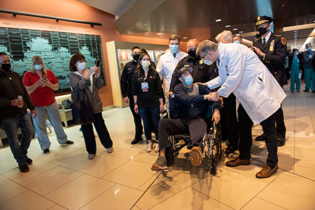 Officer Christopher Racioppo leaving Stony Brook University Hospital