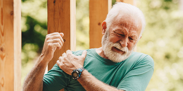 Elder gentleman experiencing should pain